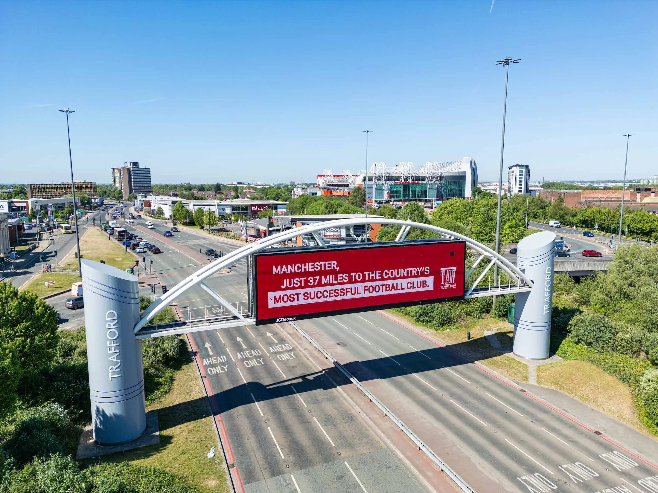 The Anfield Wrap’s 20th league-title billboard campaign overlooking a Manchester road